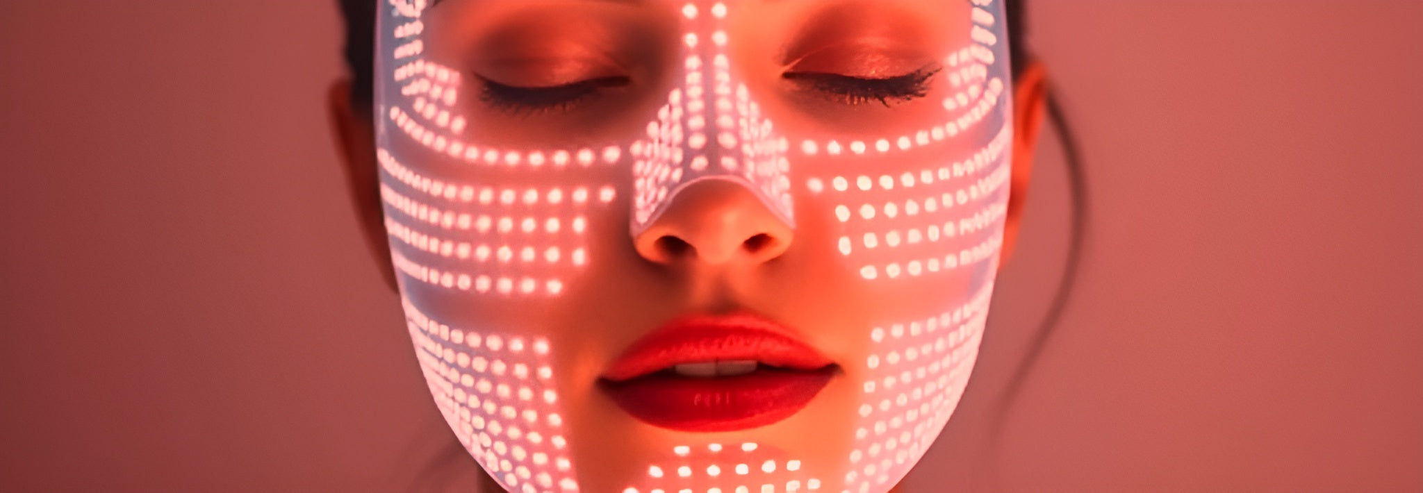 Person using Lucibelle Paris LED mask, a premium beauty device for advanced photobiomodulation and skin rejuvenation.