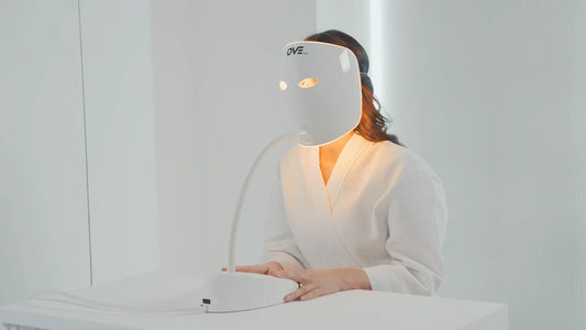 Close-up of red light LED therapy device on face